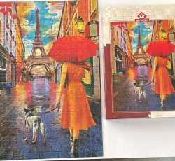 تابلو پازل چیده شده دختری در پاریس ۵۰۰ تکه