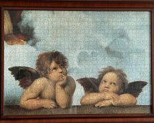 تابلو پازل چیده شده فرشتگان کوچک اثر رافائل 1000 تکه