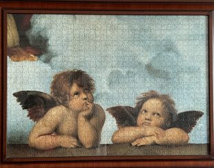 تابلو پازل چیده شده فرشتگان کوچک اثر رافائل 1000 تکه