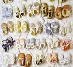 تابلو پازل چیده شده 500 تکه کفشهای نوزاد